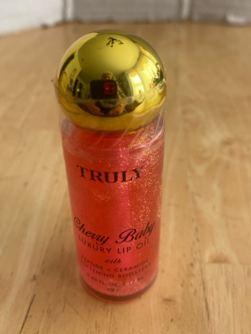 Truly shimmery Cherry Baby Luxury Lip Oil with peptides & ceramides. Sealed. NWT